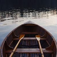 Scattering ashes from a rowboat
