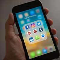 Set up a memorial account on social media